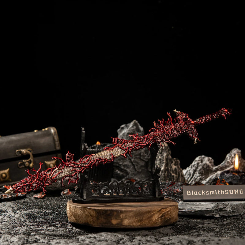 Level up your gaming room decor with this insane Blasphemous Blade replica. ?? Displayed on a custom stand, this Elden Ring weapon brings the dark aesthetic of Rykard and the Volcano Manor straight to your desk. The perfect gift for gamers looking for unique metal art and desk accessories.