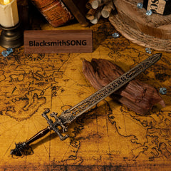 A legendary armament of Carian Manor. ???? This Sword of Night and Flame replica features stunning details of the astrological and fire motifs. Cast in high-quality zinc alloy, this metal sword is perfect for your desk setup, symbolizing the union of the stars and the fire giants. A must-have Elden Ring collectible.