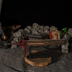 A tribute to the Shaded Castle. ?? This Marais Executioner's Sword metal replica sits menacingly on a custom stand, surrounded by iron chains and roses. The perfect gaming desk decoration for Elden Ring players who master the Arcane arts and the Eochaid's Dancing Blade. - Large display rack