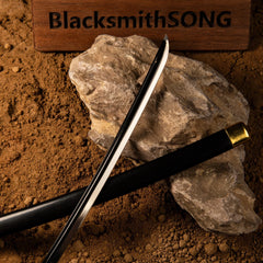 BlacksmithSONG anime-style zinc alloy sword replica with sheath on rock and sand