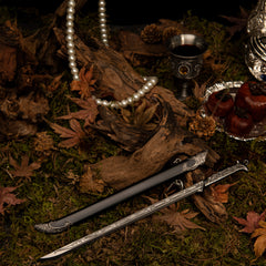 Anime-style zinc alloy sword with detailed engravings, black scabbard, pearl necklace on moss and autumn leaves