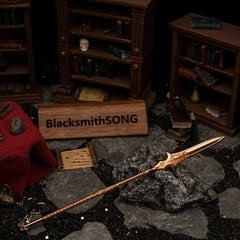 Gungnir replica (22cm die-cast zinc alloy spear) — hero shot in a handcrafted study diorama, by BlacksmithSONG.