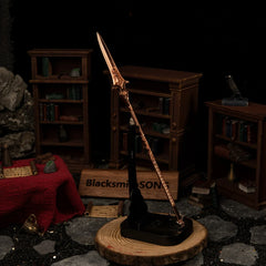 Gungnir replica — displayed upright on the vertical stand.
