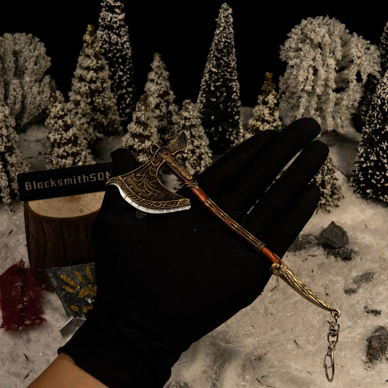 Leviathan Axe replica (16cm die-cast zinc alloy axe) — held in hand for scale.