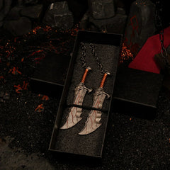 Blades of Chaos replica — both blades seated in the foam-lined gift box.