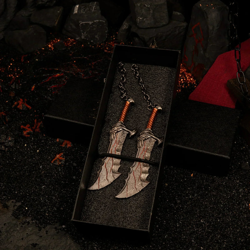 Blades of Chaos replica — both blades seated in the foam-lined gift box.