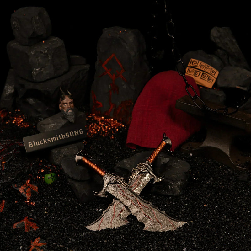 Blades of Chaos replica — the pair on black volcanic grit beside rune-carved stone and glowing embers.