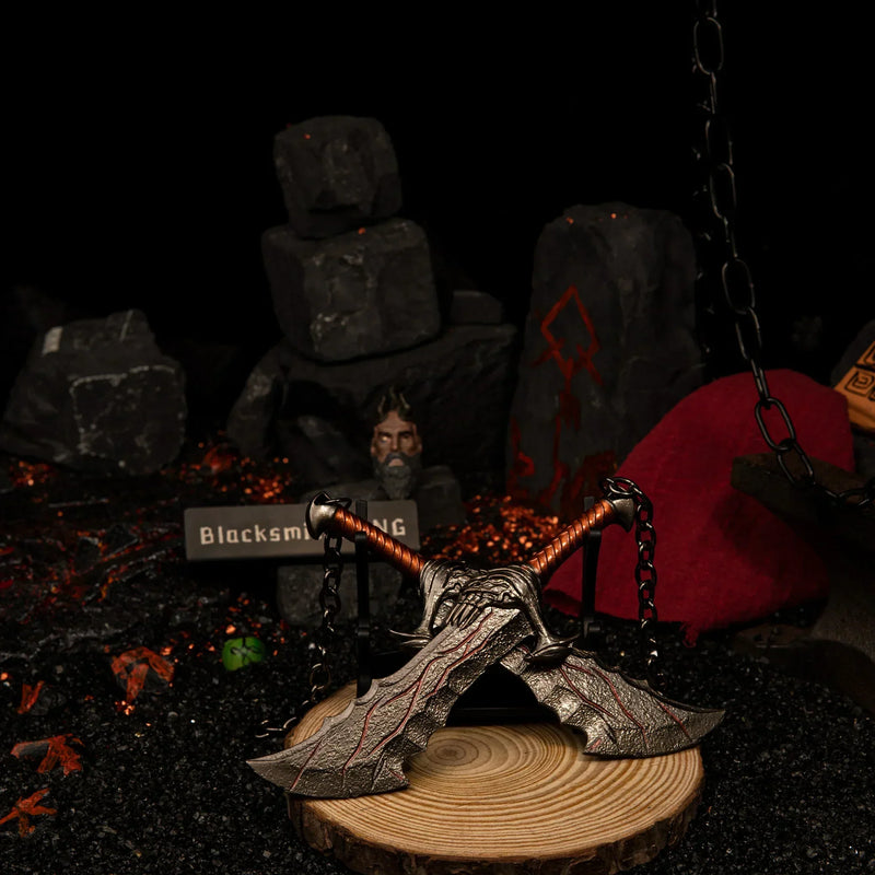 Blades of Chaos replica — small stand display, second angle on the volcanic rock set.