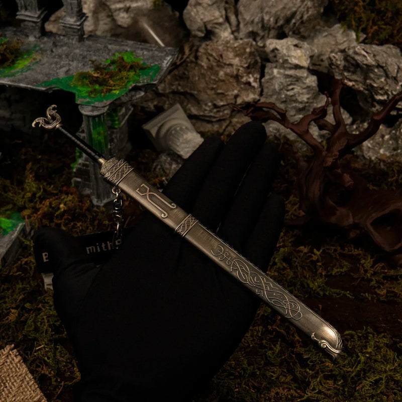 Thrungva replica (22cm die-cast zinc alloy sword) — held in hand for scale.