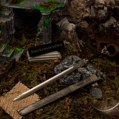 Thrungva replica (22cm die-cast zinc alloy sword) — hero shot in a moss-covered ruin, by BlacksmithSONG.