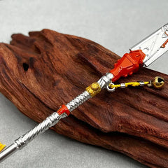 Anime-style 1:6 zinc alloy weapon replica with silver, gold, and red details on wood display