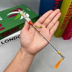 1:6 scale anime-style zinc alloy spear replica with orange and yellow details displayed on hand