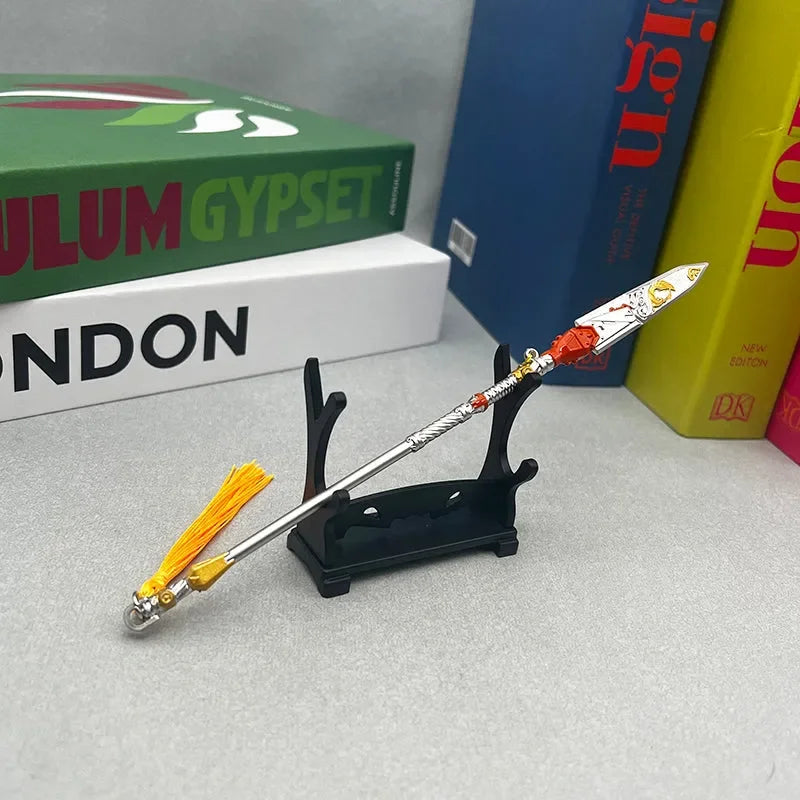 1:6 anime-style zinc alloy spear replica with yellow tassel on display stand, books background