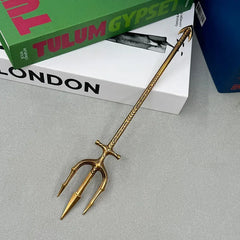 Anime-style zinc alloy trident replica collectible on table, BlacksmithSONG display item