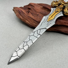 1:6 scale anime-style zinc alloy sword replica with gold and silver details on display