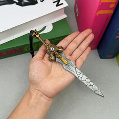 Hand holding 1:6 scale anime-style zinc alloy sword collectible with gold and silver details.