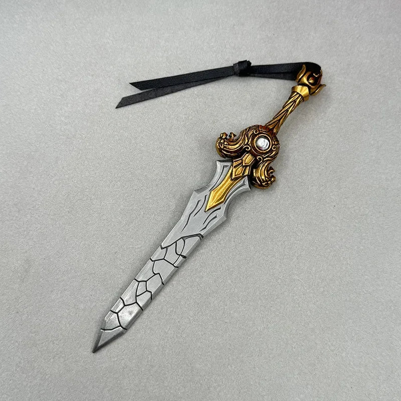 Anime-style zinc alloy mini sword replica with ornate gold hilt on gray background