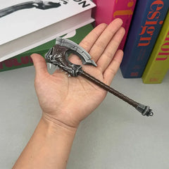 Hand holds 1:6 scale anime-style zinc alloy axe replica, fantasy weapon collectible display.