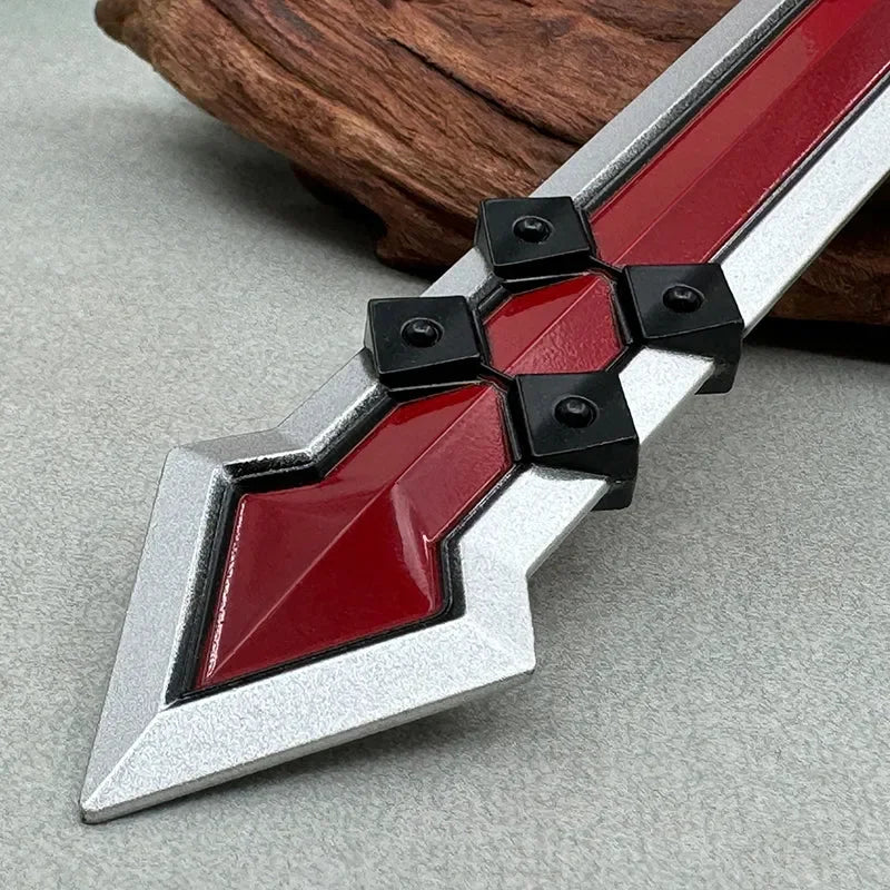 Close-up of a red and silver anime-style zinc alloy sword replica, collectible cosplay weapon