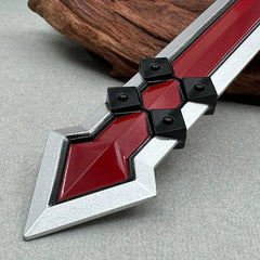 Close-up of a red and silver anime-style zinc alloy sword replica, collectible cosplay weapon