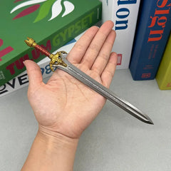 Hand holding a 1:6 scale anime-style zinc alloy sword replica collectible