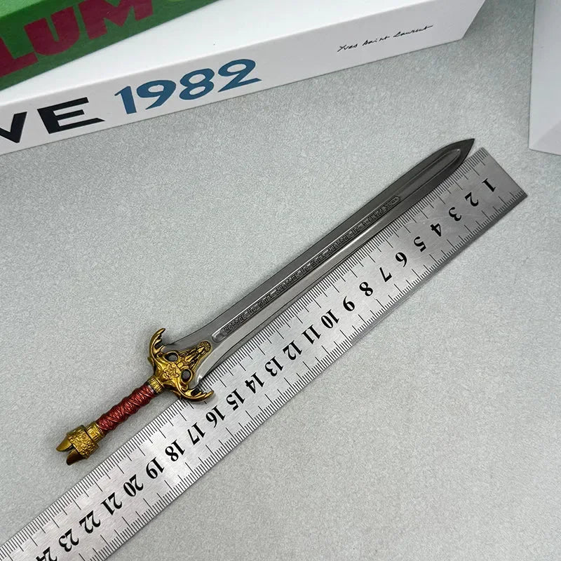1:6 anime-style zinc alloy replica sword with detailed hilt beside a ruler on tabletop