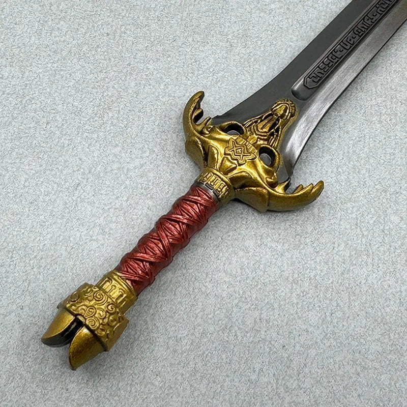 1:6 anime-style zinc alloy replica sword with gold hilt and red wrapped handle on gray background