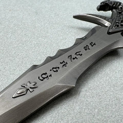 Close-up of 1:6 anime-style zinc alloy replica sword with engraved runes, BlacksmithSONG collectible.