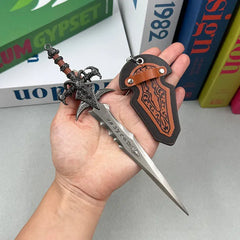 Anime-style zinc alloy sword replica with detailed hilt and sheath, held in hand, collectible.