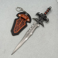 Anime-style zinc alloy sword replica with ornate black hilt and decorative sheath keychain.