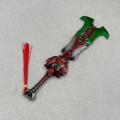Anime-style zinc alloy fantasy sword replica with green and red accents, red tassel, on gray background