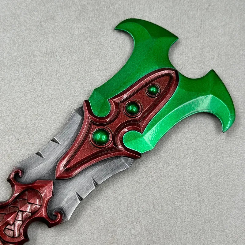 Anime-style zinc alloy fantasy sword replica with green and red blade on gray background