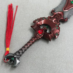 Anime-style zinc alloy sword replica with red tassel and gemstone details, collectible display