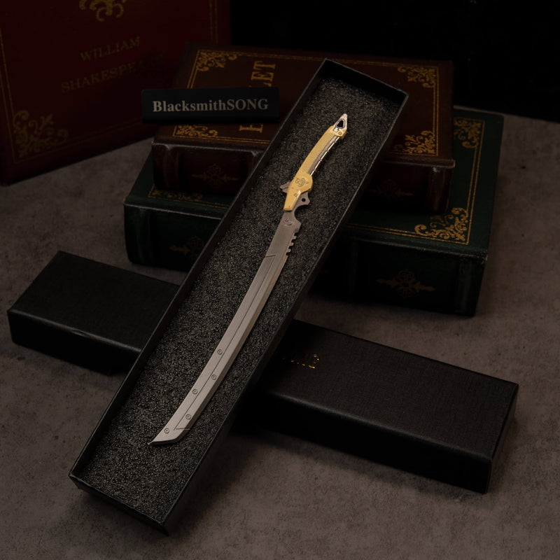 Gold-Hilt Serrated Katana replica — in its foam-lined gift box.