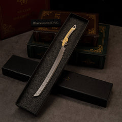 Gold-Hilt Serrated Katana replica — in its foam-lined gift box.
