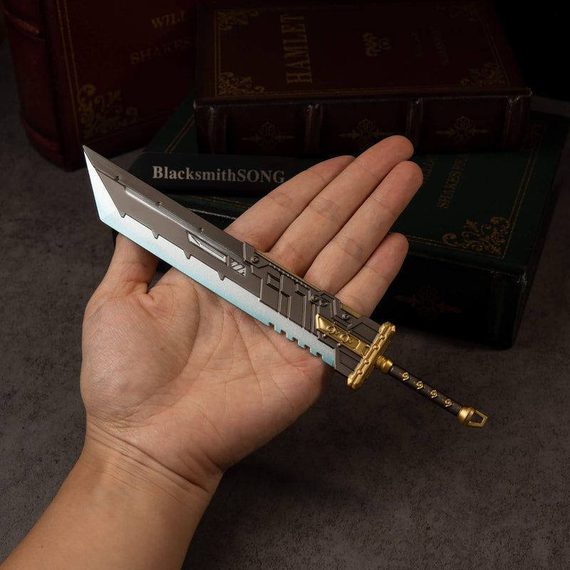 Buster Sword R5 replica (21cm die-cast zinc alloy greatsword) — held in hand for scale.
