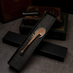 Patu replica — resting in its black foam-lined gift box.