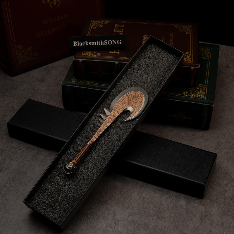 Patu replica — resting in its black foam-lined gift box.