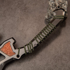 War Club replica — close-up of the olive coil wrap along the grip and a copper-orange panel.