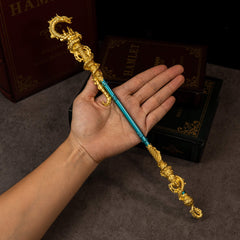 Golden Loong Staff replica (35cm die-cast zinc alloy cudgel) — held in hand for scale.