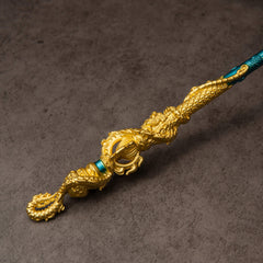 Golden Loong Staff replica — second close-up of the coiled gold dragon beside the teal shaft.