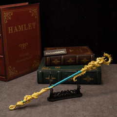 Golden Loong Staff replica — displayed on the large stand.