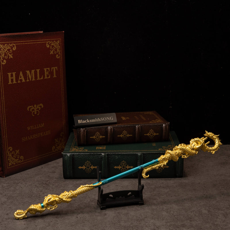 Golden Loong Staff replica — displayed on the small stand.