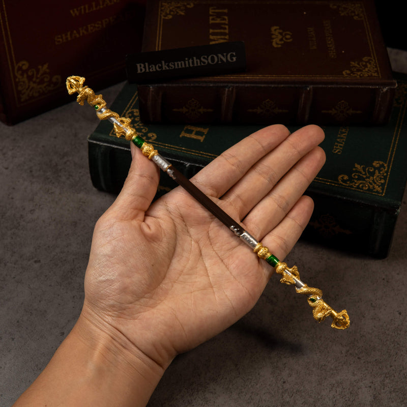 Loongwreathe Staff replica (22cm die-cast zinc alloy cudgel) — held in hand for scale.