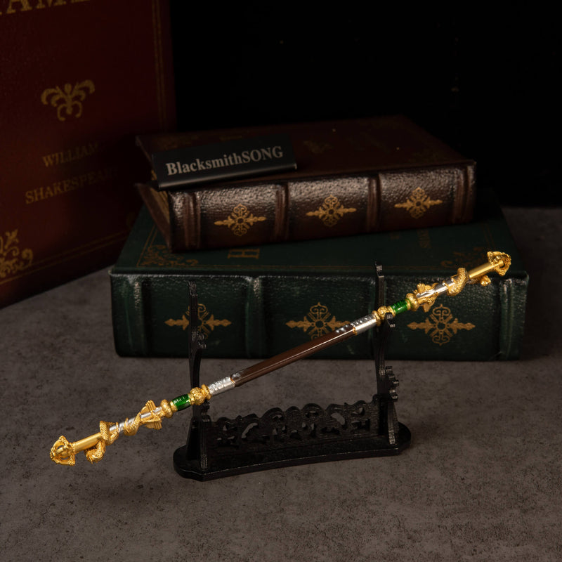 Loongwreathe Staff replica — displayed on the large display stand.