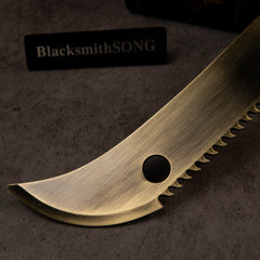 Zodiac Tiger Sabre replica — blade-tip close-up showing the round hole and serrated edge.