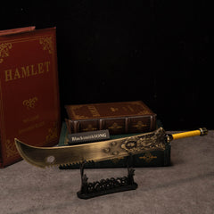 Zodiac Tiger Sabre replica — displayed on the large display stand in front of stacked books.