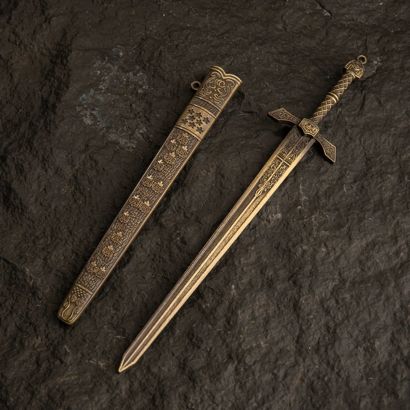Banished Knight's Greatsword metal replica and its scabbard isolated on a dark background.