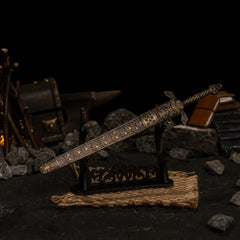 Banished Knight's Greatsword displayed horizontally on a large black sword stand over burlap.