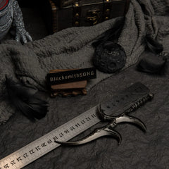 Black Knife replica placed next to a ruler showing a length of approximately 18cm.